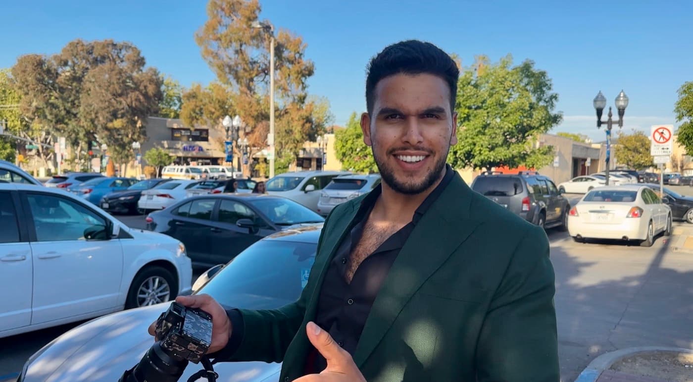 AJ Singh recording his Insta GQ video review in a green blazer