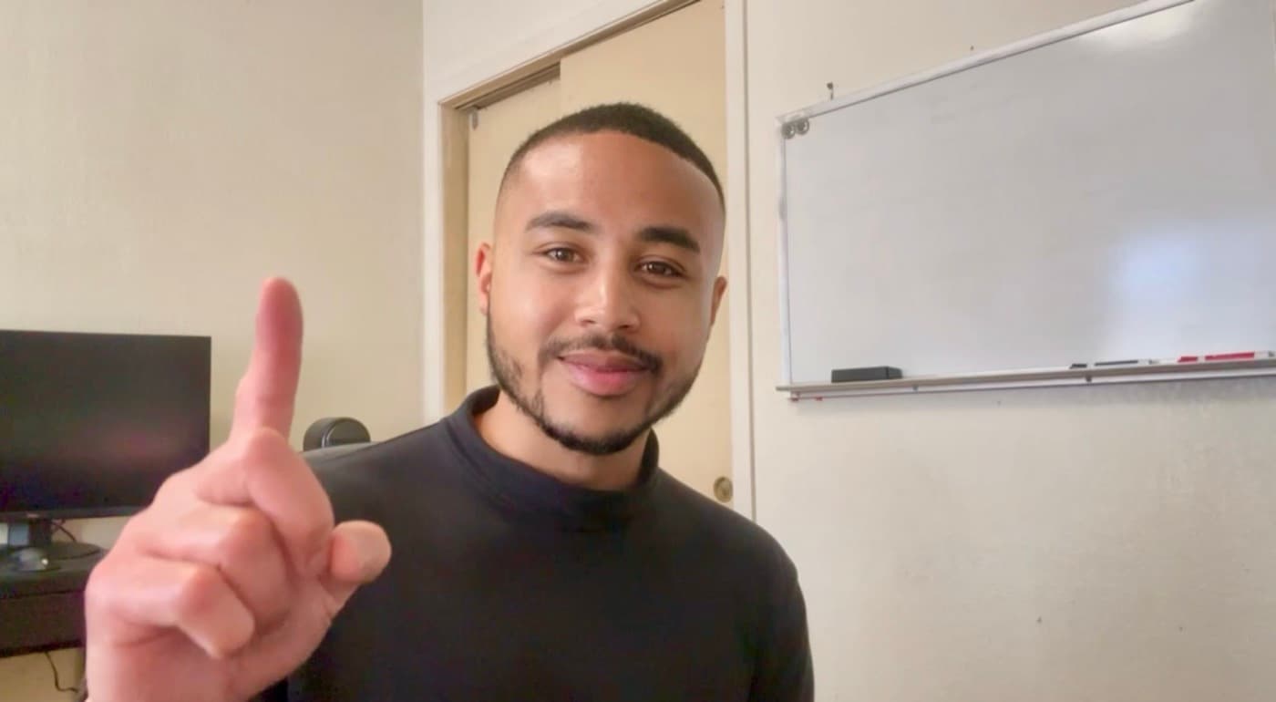 Tre’ Dabney recording his Insta GQ video review at his office